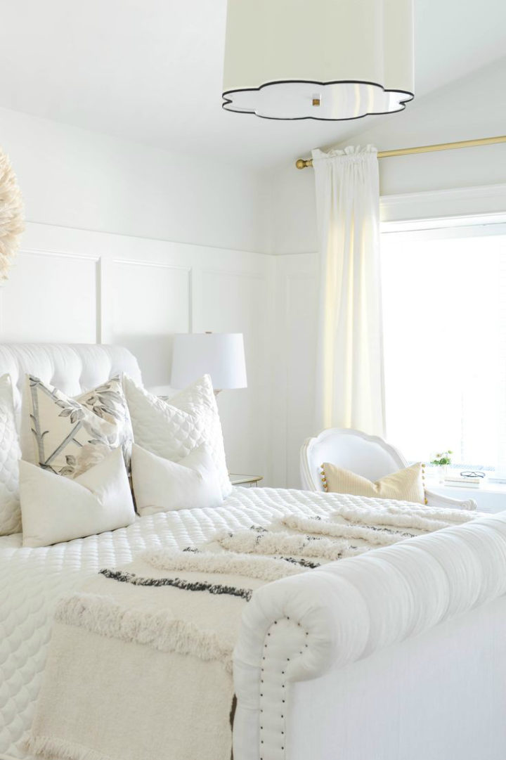 white bedroom with white walls